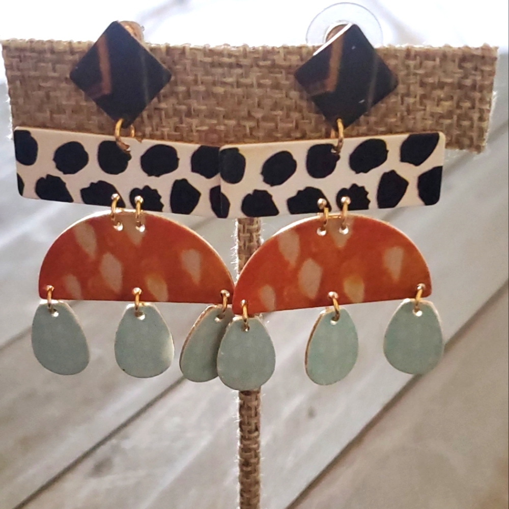 Multi color Earrings with different patterns. They are in metal.